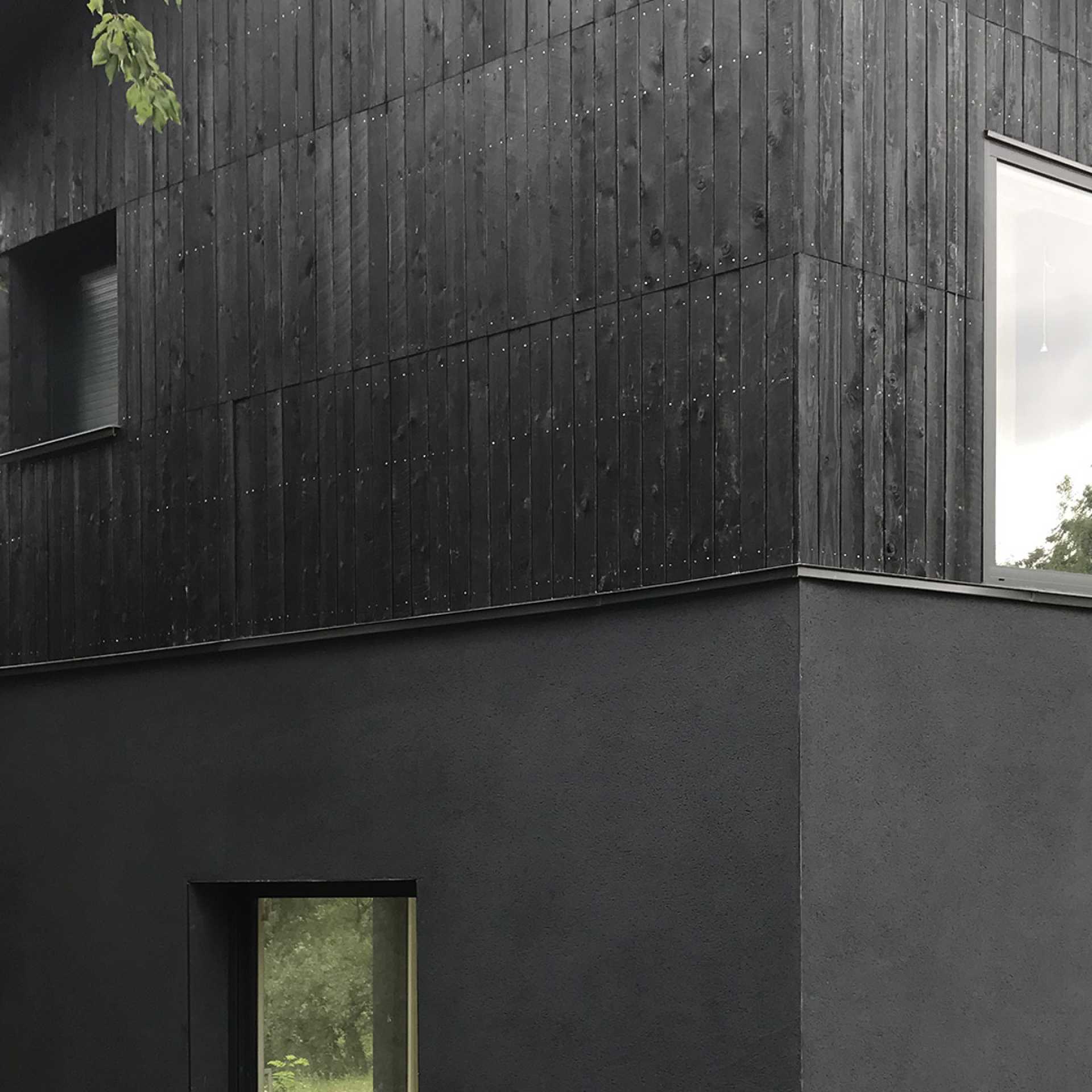 FAY ARCHITECTES - Maison individuelle, Construction neuve en bois brûlé à Chasselay.